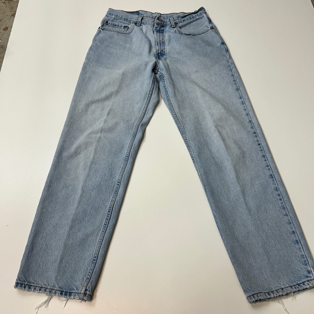 Vintage Levis 550 Relaxed Fit Light Wash Denim Jeans Mens 34x32 Made in Mexico